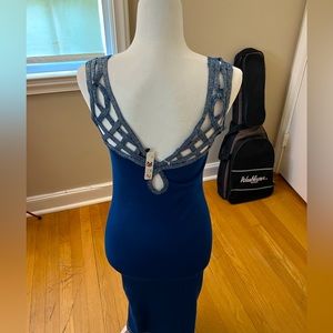 Sweater material fancy dress with lattice and gold accents